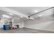 Three car garage with ceiling lighting and three garage doors at 4210 Holly Ne Cir, Conover, NC 28613