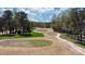 Scenic aerial view of a lush golf course with manicured greens and mature trees at 4210 Holly Ne Cir, Conover, NC 28613