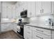Well-equipped kitchen with granite countertops, ample cabinet space, and modern appliances at 4210 Holly Ne Cir, Conover, NC 28613