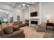 Inviting living room with a cozy fireplace and stylish decor, creating a warm and welcoming ambiance at 4210 Holly Ne Cir, Conover, NC 28613