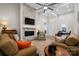 Bright living room featuring a stone fireplace, hardwood floors, and open layout for entertaining at 4210 Holly Ne Cir, Conover, NC 28613