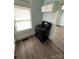 This kitchen features a black range and oven, and a single small cabinet above at 4510 Wildwood Ave, Charlotte, NC 28208