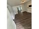 A comfortable living room with neutral-colored walls and plenty of natural light at 4510 Wildwood Ave, Charlotte, NC 28208
