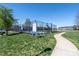 Community basketball court surrounded by green lawns and townhomes at 4644 Craigmoss Ln, Charlotte, NC 28278