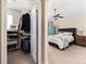 View from the bedroom with a view of the spacious closet with shelving and hanging rods at 4644 Craigmoss Ln, Charlotte, NC 28278