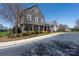 Stone-clad clubhouse exterior with well-manicured landscaping on a sunny day at 4644 Craigmoss Ln, Charlotte, NC 28278