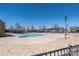 Large community pool with lounging areas and various neighborhood buildings at 4644 Craigmoss Ln, Charlotte, NC 28278