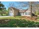 Charming single Gathering home with manicured lawn and attached two car garage at 5291 Moonlight Sw Trl, Concord, NC 28025