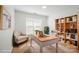 Comfortable home office with neutral decor and hardwood floors at 5291 Moonlight Sw Trl, Concord, NC 28025