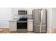 Close up of kitchen with stainless steel appliances and granite countertops at 5291 Moonlight Sw Trl, Concord, NC 28025