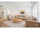 Spacious living room with bright natural light, neutral decor, and hardwood floors at 5291 Moonlight Sw Trl, Concord, NC 28025