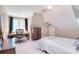 Bedroom with neutral walls, a desk by the window, and a wooden chest of drawers at 5419 Sunningdale Dr, Charlotte, NC 28277