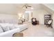 Bright and airy bonus room showcasing a sectional sofa, lounge area, and neutral décor at 5419 Sunningdale Dr, Charlotte, NC 28277