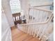 Grand two-story foyer with hardwood staircase, high ceilings, and a statement chandelier at 5419 Sunningdale Dr, Charlotte, NC 28277