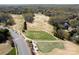 Aerial view showcases the golf course and surrounding community in the Providence Country Club at 5419 Sunningdale Dr, Charlotte, NC 28277