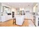 Well-appointed kitchen with an island, stainless steel appliances, and ample counter space at 5419 Sunningdale Dr, Charlotte, NC 28277