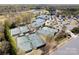 An aerial view of multiple outdoor tennis courts available for residents of Providence Country Club at 5419 Sunningdale Dr, Charlotte, NC 28277
