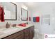 Elegant bathroom showcasing a double vanity with granite countertop and modern fixtures at 552 Odell School Rd, Concord, NC 28027