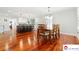 Open floor plan showcasing the dining room and spacious kitchen with a central island at 552 Odell School Rd, Concord, NC 28027