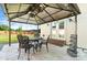 Charming gazebo and outdoor seating with fans and lighting, perfect for outdoor entertaining at 552 Odell School Rd, Concord, NC 28027