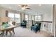 Open loft area with comfortable seating and natural light at 6250 Tea Olive Dr # 240, Harrisburg, NC 28075