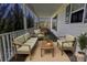 Relaxing front porch with stylish seating, perfect for enjoying the outdoors and neighborhood views at 6308 Brumit Ln, Charlotte, NC 28269