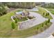 Community amenity center featuring a pool, playground, tennis court, and a parking lot at 700 Sunset Pointe Dr, Salisbury, NC 28146
