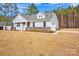 Charming single-Gathering home featuring stone accents, a two-car garage, and manicured landscaping at 700 Sunset Pointe Dr, Salisbury, NC 28146