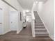 Inviting hallway with stairs and neutral colors at 700 Sunset Pointe Dr, Salisbury, NC 28146