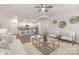 Open concept living and kitchen area with hardwood floors and lots of natural light at 700 Sunset Pointe Dr, Salisbury, NC 28146