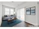 Relaxing living room with sliding doors and natural light features stylish decor and a comfortable seating area at 700 Sunset Pointe Dr, Salisbury, NC 28146