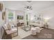 The living room has hardwood floors and lots of natural light at 700 Sunset Pointe Dr, Salisbury, NC 28146