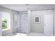 Modern bathroom featuring a glass shower with marble-style tile surround and window at 7027 Short Stirrup Ln, Mint Hill, NC 28227