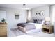 Comfortable main bedroom featuring a plush bed, stylish decor, and ample natural light at 7027 Short Stirrup Ln, Mint Hill, NC 28227