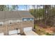 Townhome exterior with attached garage and view of the surrounding community at 7918 Nelson Rd, Mint Hill, NC 92227