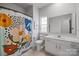 Bathroom featuring a colorful shower curtain and a white vanity at 7918 Nelson Rd, Mint Hill, NC 92227
