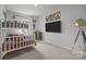 Bedroom featuring a bunk bed and a large television at 7918 Nelson Rd, Mint Hill, NC 92227