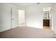 Bright bedroom boasts an ensuite bathroom at 9516 Coast Laurel Nw Ave, Concord, NC 28027