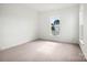 Bedroom with carpet flooring, neutral paint, and a window, ideal for relaxation at 9516 Coast Laurel Nw Ave, Concord, NC 28027