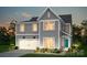 Charming two-story home featuring a gray exterior, attached garage, and landscaped front yard at 9516 Coast Laurel Nw Ave, Concord, NC 28027