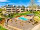 Beautiful community in-ground pool with pool house and lounge chairs at 9709 Emerald Point Dr # 6, Charlotte, NC 28278