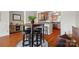 Cozy dining area with modern table and barstool seating, perfect for casual dining and entertaining at 9709 Emerald Point Dr # 6, Charlotte, NC 28278