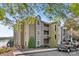 Exterior view of a condo building with nicely landscaped surroundings at 9709 Emerald Point Dr # 6, Charlotte, NC 28278