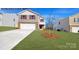 Charming two-story home with a well-maintained lawn and attached two-car garage at 1054 Horizon Ln, Chester, SC 29706