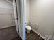 Toilet room featuring a toilet and view into a walk-in closet at 1054 Horizon Ln, Chester, SC 29706