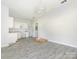 Spacious open living space with a view of an unfinished modern kitchen at 108 Graham St, Chester, SC 29706