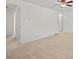 Large, carpeted bedroom with multiple closets and doorways at 1205 Scaleybark Rd # A, Charlotte, NC 28209
