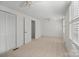 Spacious carpeted bedroom with bright natural light at 1205 Scaleybark Rd # A, Charlotte, NC 28209