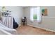Comfortable bedroom featuring a guitar, shelving and plenty of natural light at 130 Atwell Rd, Mt Ulla, NC 28125