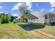 Spacious covered parking area alongside a well-maintained lawn, perfect for vehicle storage at 130 Atwell Rd, Mt Ulla, NC 28125